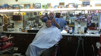 Jon Tester getting a haircut